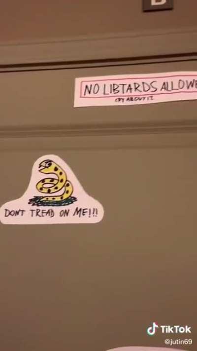 Ultra Chad decorates his door while normies watch in despair