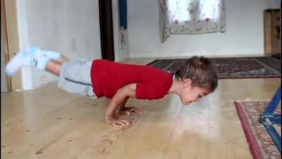 Kid doing 90 degree pushups