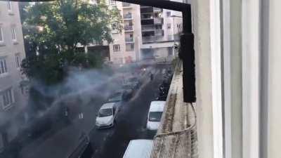 French wizards fighting in the street.