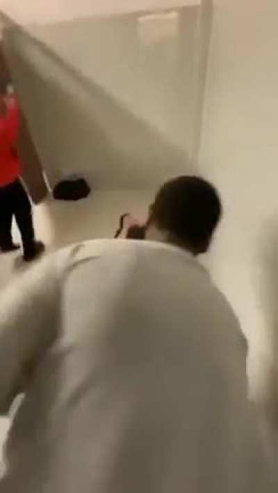 kid gets his head slammed onto bathroom wall.