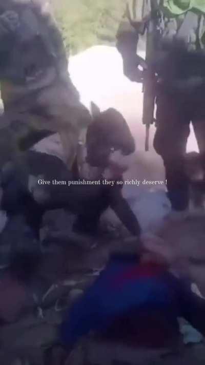 India's 9 Para Regiment using a Kukhri to chop off a militant's head