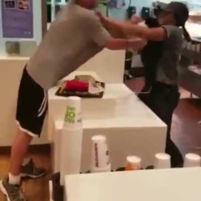 Man instantly regrets grabbing a McDonald's worker by the collar