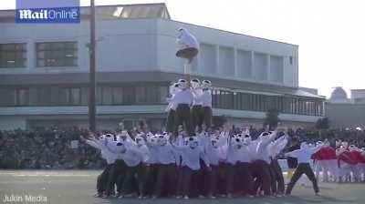 Bo-taoshi is a Japanese &quot;capture the flag&quot; game where 2 teams of 75 a side try to move the opposition's pole lower than 30° to the horizontal. Punching, kicking, strangling, pulling heads, are all permitted.