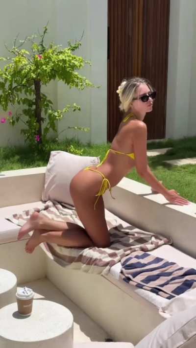 Polina Malinovskaya - Sunbathing in a Yellow Thong Bikini on an Outdoors Couch (IG Story Clip)