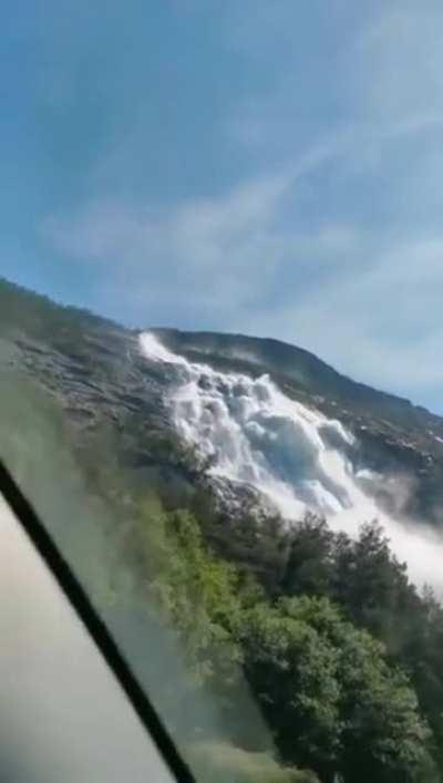 🔥 Langfossen Waterfall in Norway thunders right past the roadside