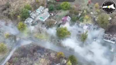 A Ukrainian tank shells a Russian position in the village of Illinka, Donetsk Oblast