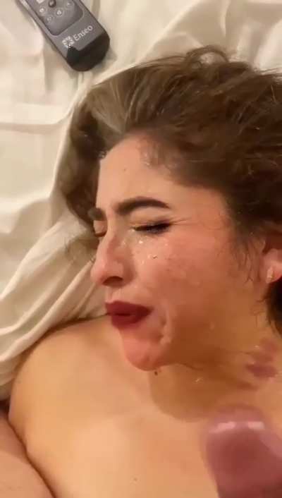 MILF on bed can barely tolerate his facial (source in comments)