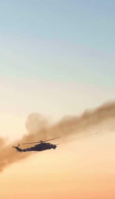 Ukrainian MI-24 fires a salvo of unguided missiles at Russian positions.