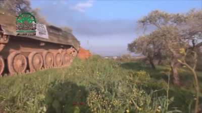 Ahar al-Sham BMP-1 lobbing shells at the Syrian Army controlled Ghassan Aboud Checkpoint - Idlib - 3/25/2015