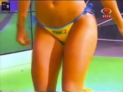 South American star Paloma Fiuza (2000s) doing one of her popular bikini teases on Brazilian variety show back in the day