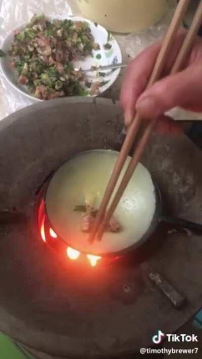 Making an egg dumpling