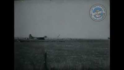 Airborne combat cameraman jumps outside of Eindhoven with a camera attached to his chest - Operation Market Garden - 9/17/1944