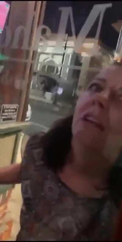 Old lady tries to ram herself into a restaurant and licks the glass