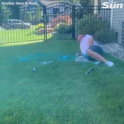 Flare hits dad-to-be in the crotch at a gender reveal party