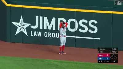 Angels right fielder Jo Adell deflects a fly ball over the fence for a home run