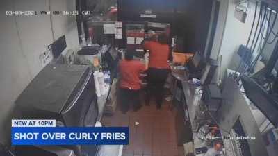 Jack-in-the-Box worker got pissed at a drive through customer who complained about missing curly fries so she took her gun out and shot at him