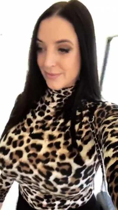 Walking in a leopard sweater