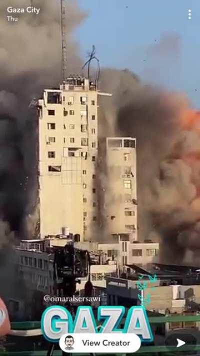 Rockets destroying a building in Gaza