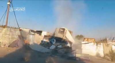 Hamas footage from Khan Younis shows an IDF armored bulldozer destroying structures in Gaza's 2nd largest city, bursting through a wall, and then being immediately hit with an RPG that goes straight into the cab of the dozer where the driver sits.