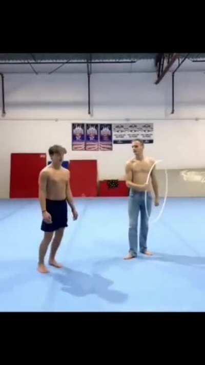 3 Men Through a Hula Hoop.