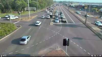 Threading the needle, Australia style (but maybe more luck than skill, but only the driver knows.)