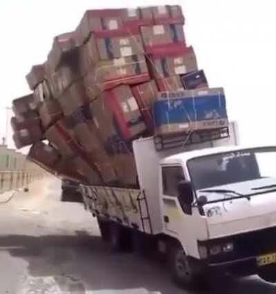 WCGW with a stack of boxes twice the heoght of the truck?