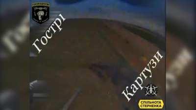 Ukrainian kamikaze drones destroy two Russian BMPs when crossing the border into Kharkiv Oblast. 10 May 2024 (at 50.3115, 36.4655)