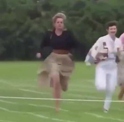 1991, Princess Diana breaking royal protocol by participating in a Mother's Day race at Prince Harry's school.