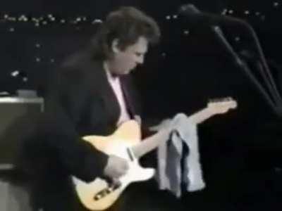 Danny Gatton plays guitar with a beer... then a towel