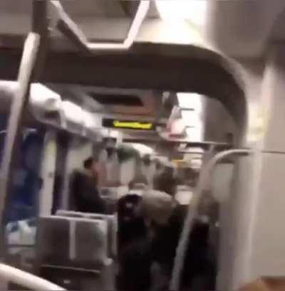 Man starts smoking inside a tram. After being asked to put down the cigarette he savagely beats up a man that approached him to put it down himself