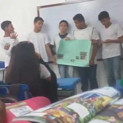 Student laughs at school presentation and gets hit in the face with a pen