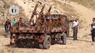 A trio of mortars attached to a flatbed truck and used to engage Syrian Army positions simultaneously in al-Kabbas - 2013