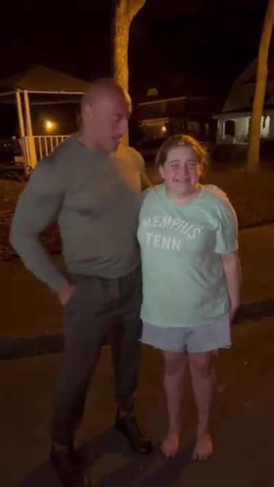 The Rock spends some time with a fan who waited over two hours to see him.