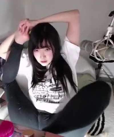 Aria stretching on her chair - 2023