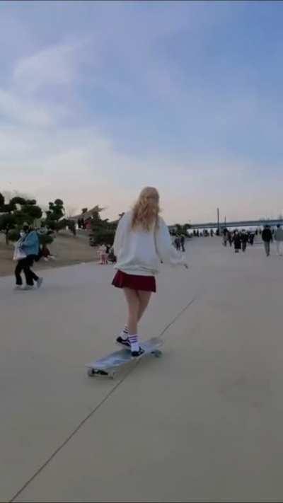 Dancing on a longboard