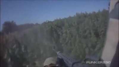 USMC Machinegunner sprays M240b at taliban position after being ambushed in a pot field.