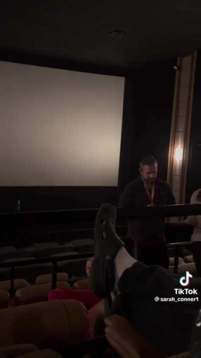 Dude disrupts movie because he is not in his assigned seat 