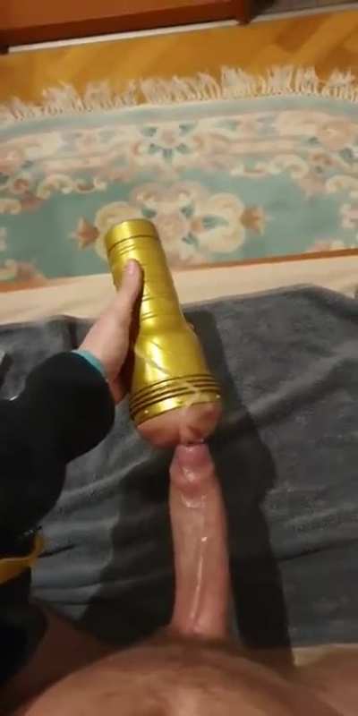 He can't resist thrusting back into his fleshlight after spurting all over her