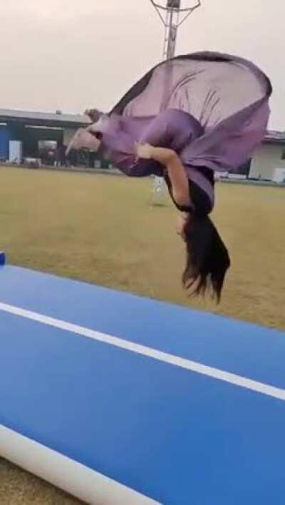 Triple Backflip in a Saree (indian traditional dress)