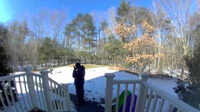 Husband typing to his wife with his nose so he wouldn't have to take his gloves off