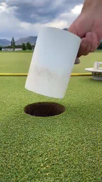 Cutting and painting a tournament golf cup