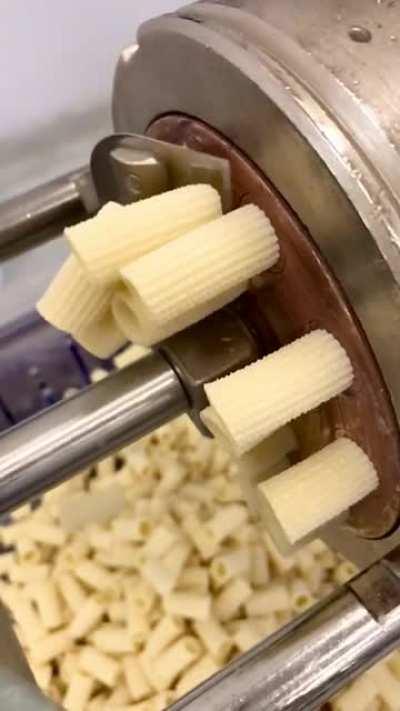 I work for a specialty food provider and we make fresh pasta three times a week. Here’s our freshly extruded Rigatoni. Enjoy!