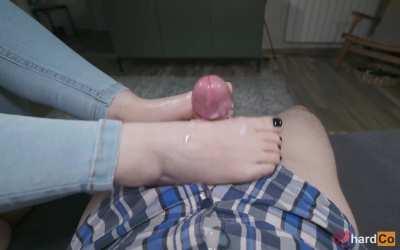 Making him shoot a big load with just my petite feet