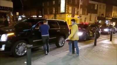 Two drunk guys imitate Connor Mcgregor as he drives past