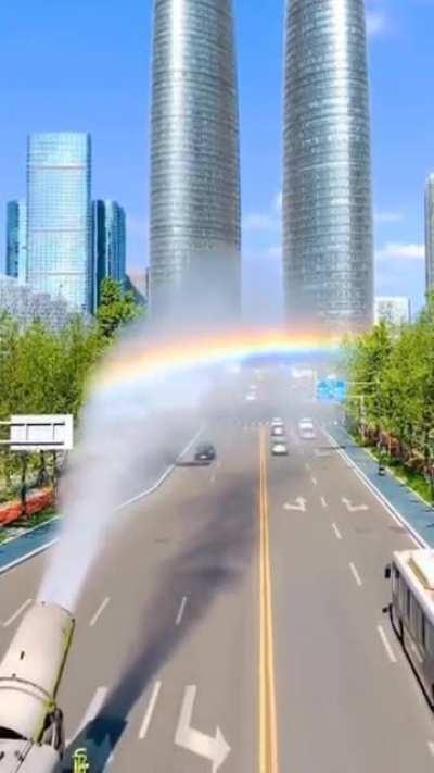 Fog cannon leaving in its trail a rainbow