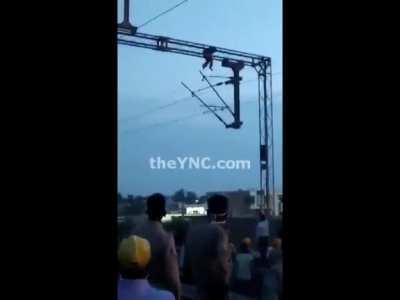 Man finds out why you shouldn't play with an overhead wire