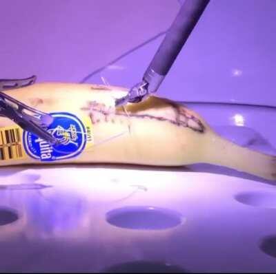 Surgeon in London performing remote operation on a banana in California using 5G!