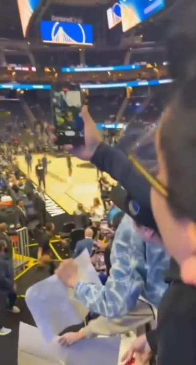 Golden State Warriors legend Steph Curry hits a full court shot from the tunnel. 