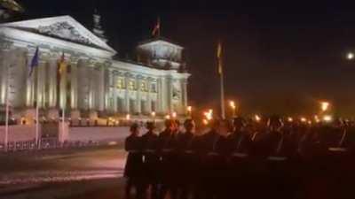 German soldiers march in front of the Reichstag building to honor those who served in Afghanistan. 20 years Bundeswehr in the Hindu Kush. 20 years that have shaped Germany.