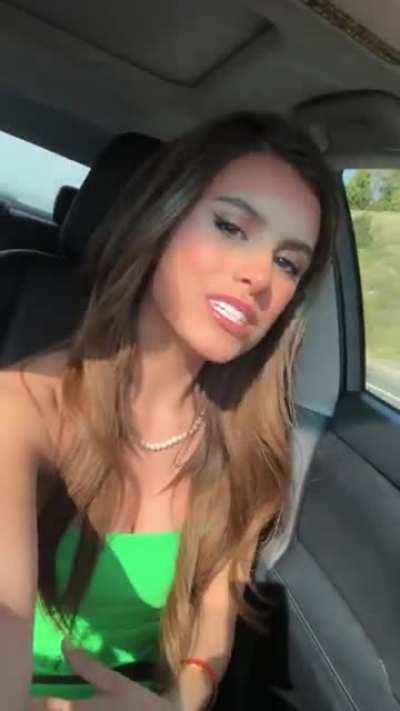 Green dress in the car